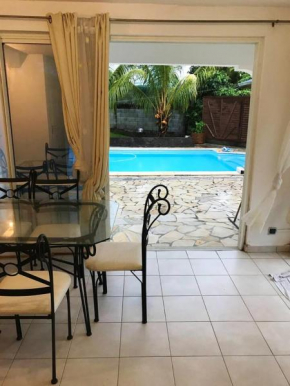 Appartement confort à Sainte-Rose avec piscine partagée